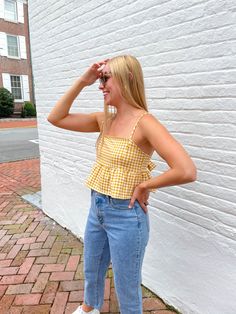 Mustard gingham pattern crop top Ruffle detail with tie in back Model is 5'4 wearing a size S Fit is true to size 63% Polyester, 34% Rayon, 3% Spandex Need help with sizing or styling? Email rebecca at info@rebeccaolivia.com Yellow Crop Top Outfit, Gingham Top Outfit, Gingham Crop Top, Pattern Crop Top, Outfits Gorditas, Yellow Gingham, Gingham Top, Patterned Crop Top, Yellow Crop Top