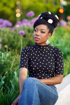 Tammi Savoy Wearing our Denise Top in Daisy Dot #heartofhaute #hautehoney #daisyprint #daisies #mocneck #mocknecktop #sustainablefashion #tammisavoy #pinupgirl #vintagestyle #madeincalifornia #madeinlosangeles #chocolatecheesecake #1950s #1960s #vintagelover #blackpinupgirl #vintagehairstyle #pinupsofcolor #madeintheusa #beehivehair #uniquevintagefashion #60shairstyle #vintageinspired #vintageinspiredfashion #styleinspo #vintagestyleinspo Tie Neck Tops, Work Blouse, Keep It Simple, Work Attire