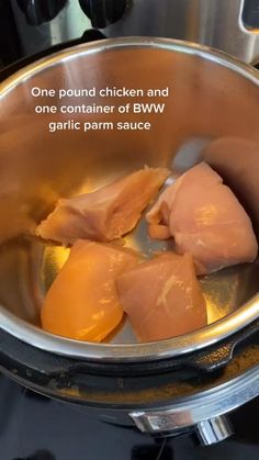 chicken and garlic cooking in an electric pressure cooker with the words one pound chicken and one container of bwv garlic parm sauce