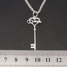 "Polyamory Key Necklace for Women Base Material: 925 Sterling Silver Size: 20mm X 25mm (Approximately) Chain Length: 16'' - 24'' Inches Thickness: 1.5mm Metal Stamped: 925 You'll receive Order Shipped Email from us when your item is completed and shipped. SPECIAL ANNOUNCEMENT 1. Please visit https://www.etsy.com/shop/yhtanaff for more designs. 2. Subscribe our newsletter to receive a Coupon Code for 10% discount. \"At Our Shop Profile's Announcement Section\" 3. Please LIKE our Facebook Fan Page Infinity Heart, Key Necklace, Heart Jewelry, Necklace For Women, Metal Stamping, Pure Silver, Jewelry Branding, Chain Length, Coupon Code