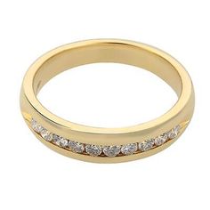 This 14k yellow gold Men's wedding band is 5.50mm wide and features 10 round cut diamonds in a channel setting. The ring has a high polished satin finish and rounded edges for a comfort-fit. Approximately 0.66 carat total diamond carat weight. Diamond color G and SI1 clarity. Comes in our jewelry box. Channel Setting, Channel Set, Diamond Wedding Band, Diamond Color, Mens Wedding Bands, Diamond Carat, Diamond Wedding Bands, Round Cut Diamond, Diamond Wedding