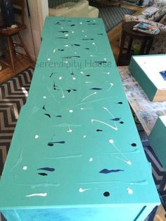 a long table with blue paint on it