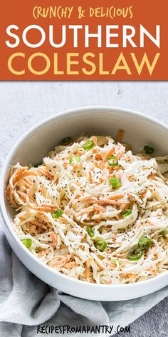 a white bowl filled with coleslaw on top of a table