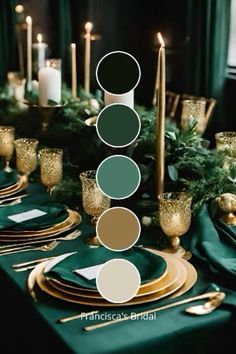 the table is set with green and gold plates, silverware, candles, and greenery