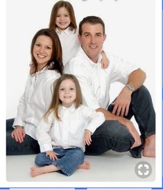 an image of a family posing for a photo with the caption's name on it