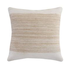 a white and beige pillow on a white background