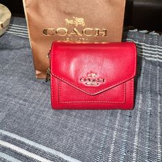 This A Brand New, Closet Kept, Never Used Compact Wallet By Coach. The Leather Is Flawless (With The Exception Of Minor Flaking In The Inside, Pictured), As Well As The Charms, No Scratches, No Tarnishing. Smoke Free Red Coach Leather Wallet, Red Leather Coach Wallet, Coach Red Wallet With Removable Pouch, Red Coach Wallet With Removable Pouch, Coach Red Bifold Wallet, Coach Coin Purse, Red Charm, New Closet, Banana Print