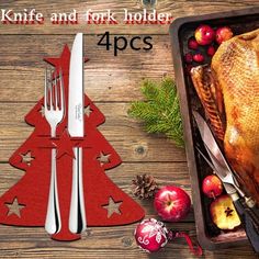 the knife and fork holder is designed to look like a christmas tree, with an image of a turkey on it