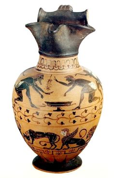 an old vase with animals painted on it