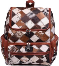 Check out our Tan Cowhide Patch Backpack, perfect for both travel and work. Made from real cowhide leather patches, this backpack is stylish and strong, ready for everyday use. Key Features: *>High Quality: Made from genuine tan cowhide leather patches, it's durable and looks great. *>Lots of Room: Plenty of space with multiple compartments and pockets for your laptop, documents, and travel essentials. *>Comfortable to Wear: Adjustable padded shoulder straps and a breathable back panel make it c Cowhide Backpack, Knapsack Bag, Backpack Patches, Rucksack Bag, Tan Cowhide, Travel Backpack, Leather Patches, Backpack Purse, Travel Essentials