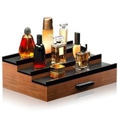 Ideal for men of all ages,From cologne and perfume bottles to your phone, wallet and other accessories. Our men's cologne organizer is an attractive option to keep your belongings conveniently in one place while keeping your living space free from clutter.This perfume display stand can be used to store and display not only colognes, but also women's perfumes, nail polish, vintage bottles or collectibles. Used as a vanity accessory tray, it makes for the perfect makeup & perfume organizer. As pop Cologne Organizer For Men, Cologne Display, Cologne Organizer, Shelf With Drawer, Perfume Display, Perfume Organization, Display Risers, Organization And Storage, Storage Display