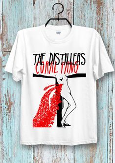 For the sizing please refer to image  and if you are unsure about this please ask for help from us White Short Sleeve Shirt With Band Logo, White Band Logo Graphic Tee, White Cotton Shirt With Band Logo, Red Short Sleeve Tops With Band Logo, Red Band Logo T-shirt With Crew Neck, Red Cotton T-shirt With Band Logo, The Distillers, Top For Ladies, Ladies And Gentlemen