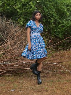 Barbecue dress in our Desert Bluebell Print in indigo blue with a geometric floral illustration. A knee length dress, featuring a v-neck with gathers, puffed sleeves & lace detailing. Relaxed dress, for your next day out brunching. Indigo Cotton Dress With Floral Print, Indigo Cotton Dresses With Floral Print, Indigo V-neck Cotton Dress, Indigo Cotton V-neck Dress, Desert Dress, Relaxed Dress, Modern India, Semi Formal Wear, Floral Illustration