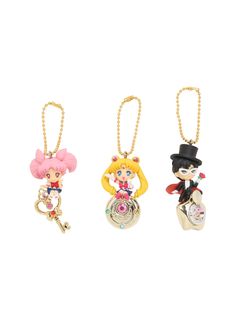 three keychais with cartoon characters on them, one is wearing a top hat