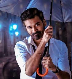 a man is holding an umbrella in the rain while wearing a white shirt and black tie