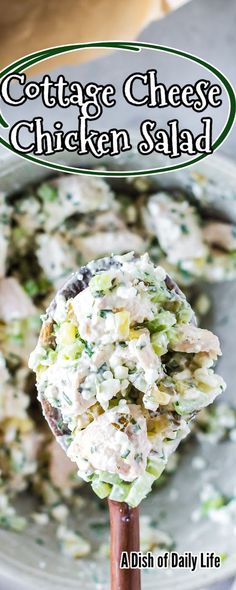 a spoon full of chicken salad on top of a white plate with the title cottage cheese chicken salad