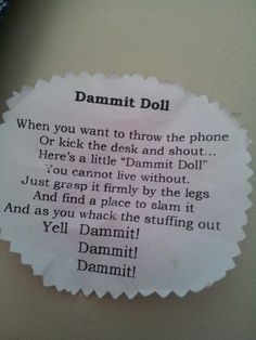 a piece of paper with the words damnit doll on it's back side