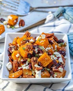 a white bowl filled with sweet potato salad