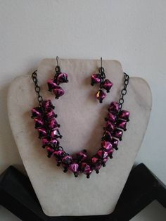 I have always loved novelty vintage jewelry ! This is my version , made by me of the statement jewelry that was so poplular in the late 40s early 50s & the colors are perfect compliment 😊 Fuschia pink and black faceted lucite beads in double rows with black aluminum chain that is 20 inches long. Matching earrings are pierced Retro Purple Jewelry For Gifts, Handmade Metal Jewelry For Party, Handmade Metal Jewelry For Parties, Handmade Pink Jewelry For Evening, Handmade Pink Evening Jewelry, Vintage Handmade Jewelry For Evening, Handmade Costume Jewelry Earrings For Party, Handmade Vintage Jewelry For Evening, Pink Necklaces With Matching Earrings For Party