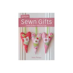 the book cover for simple sewn gifts, featuring three heart shaped ornaments hanging from hooks