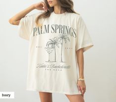 Palm Springs bachelorette party shirts lux merch perfect for celebrating before the rings! These make fun bridesmaids gifts or birthday party tees for a milestone birthday Palm Springs trip! All text elements (and colors) are completely customizable. Printed on trendy, soft, and relaxed fit Comfort Colors tshirts.  This listing is for a single shirt. Please add the number of shirts you'd like to purchase to your cart. :) ✨Free shipping on your entire order!✨  Product color may vary slightly due Los Angeles Bachelorette Party, California Birthday, Palm Springs Bachelorette Party, Text Elements, Palm Springs Bachelorette, Best Bridesmaid Gifts, Single Shirt, Bach Party, Bachelorette Shirts