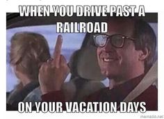 an image of a man driving with the caption when you drive past a railroad on your vacation days