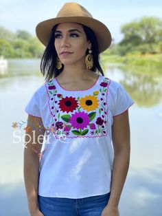 This Beautiful Mexican Blouse is full of colorful florals that are hand embroidered by Mexican Artisans in Chiapas. This blouse is beautiful and one of a kind! This blouse comes in one size which fits sizes Small and Medium. Mexican Top, Mexican Textiles, Colorful Florals, Mexican Blouse, Traditional Mexican, Bell Sleeve Blouse, Boho Blouses, Embroidered Top, Collar Shirts