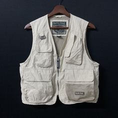 "PLEASE READ FULL DESCRIPTION BEFORE PURCHASING Vintage Pacific Trail Brand Multi Pocket Hunting Fishing Utility Tactical Sleeveless Vest Size On tag: S (Kindly please check measurement below) Material: Cotton Condition: 9/10 ( GREAT No hole. Got some Yellow Wish kindly please refer photo ) MEASUREMENT: All measurement are taken when laid flat on the ground in inches Chest (armpit to armpit): 19\" RECOMMENDED size S international Length (from top to bottom): 20\" PAYMENT & SHIPPING: Accept PAYPA Vest Street Style, Pacific Trail, Hunting Vest, Fishing Vest, Tactical Vest, Vest Designs, Mens Fashion Casual Outfits, Champion Hoodie, Sleeveless Vest