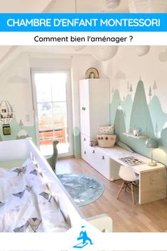 a baby's room with mountains and trees painted on the walls, along with a crib