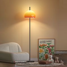 a living room scene with focus on the floor lamp and teddy bear sitting under it