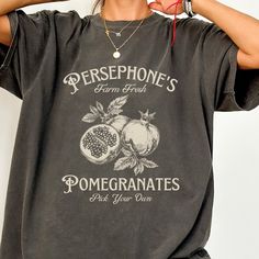 Persephone's Pomegranates Shirt, Dark Academia T-shirt, Greek Mythology Shirt, Vintage, Comfort Colors®  Express your bookish personality and join the thriving community of readers with our bookish fashion. Let your outfit reflect your literary interests and spark conversations with fellow book lovers. Gildan is back with its garment-dyed t-shirt, a fully customizable tee made 100% with ring-spun cotton. The soft-washed, garment-dyed fabric brings extra coziness to your wardrobe while the relaxe Greek Mythology Shirt, Mythology Clothes, Dark Academia Design, Bookish Fashion, Persephone Pomegranate, Dark Academia Shirt, Big Tshirt, Dyed Fabric, Greek Mythology