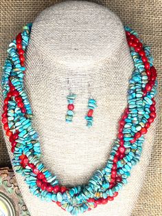 This Southwestern necklace and earrings for women is made up of red Coral and Genuine Natural Turquoise chip beads.  It is a stunning and classic  6 strand jewelry set.  The color combination is striking. This beautiful classic necklace is perfect for that natural, casual, boho look. It will make a great gift for a friend who loves beaded jewelry. It is handmade ending up in a silver toggle to create this feminine necklace. This necklace is 20" long and comes with matching earrings. This is a ge Costume Jewelry With Polished Multi-strand Beads, Southwestern Style Gemstone Jewelry With Round Beads, Southwestern Adjustable Jewelry With Colorful Beads, Southwestern Multi-strand Jewelry With Colorful Beads, Southwestern Multi-strand Colorful Beads Jewelry, Artisan Dangle Jewelry With Polished Beads, Artisan Multi-strand Beaded Jewelry, Southwestern Multi-strand Turquoise Necklace For Jewelry Making, Southwestern Multi-strand Turquoise Jewelry