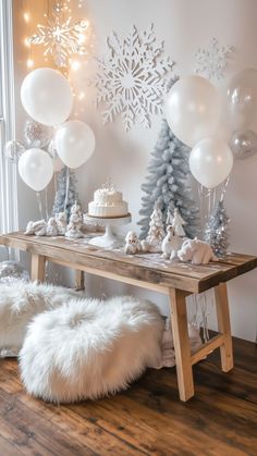 Winter ONEderland birthday party setup with rustic wooden table, snowflake decor, and white fur poufs Winter Onederland Sign, Winterland Birthday Party Decorations, 1st Birthday Winter Photoshoot, January Bday Party Ideas, Fireplace Balloon Arch, Winter 1derland Birthday Party, One Year Birthday Party Ideas Winter, Winter Theme Birthday Party Ideas, Winter Party Theme Ideas