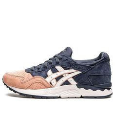 Introducing the Kith x ASICS Gel Lyte 5 'Salmon Toe' - a sneaker that was initially made available to participants of Ronnie Fieg's Zoom panel in November 2021. This special edition sneaker comes in a navy and pink color scheme, featuring a pigskin suede upper with a perforated toe box and white synthetic leather side stripes. 'KXTH' is embossed on the heel overlay, while mismatched ASICS and Fieg branding is embroidered on each tongue. A white EVA midsole packs Gel cushioning in the heel for a Casual Asics Running Shoes With Rubber Waffle Outsoles, Asics Sneakers With Boost Midsole For Light Sports, Asics Sneakers For Light Sports With Round Toe, Asics Sneakers With Rubber Waffle Outsoles For Light Sports, Asics Sneakers With Enhanced Cushioning For Light Sports, Asics Sneakers For Light Sports, Asics Leather Running Shoes With Boost Midsole, Asics Sporty Sneakers For Light Sports, Sporty Asics Sneakers With Rubber Sole