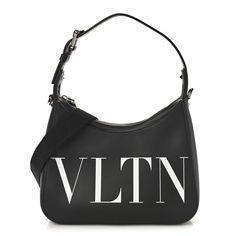 This is an authentic VALENTINO GARAVANI Calfskin VLTN Print Shoulder Bag in Black. This chic bag is beautifully crafted of calfskin leather in black. It features an optional, adjustable shoulder strap with a silver top zipper. This opens to a black fabric interior with a patch pocket. Silver Top, Drawstring Bucket Bag, Chic Bags, Silver Tops, Shoulder Bag Black, Guitar Strap, Blue Bags, Bag Straps, Black Fabric