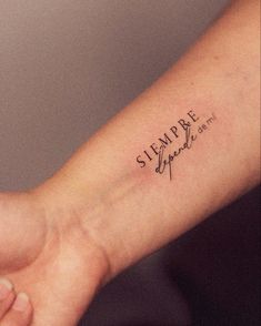 someone has a tattoo on their arm that says, stamp it up with the words