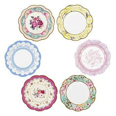 six plates with different designs on them, all decorated in pink and blue flowers are shown