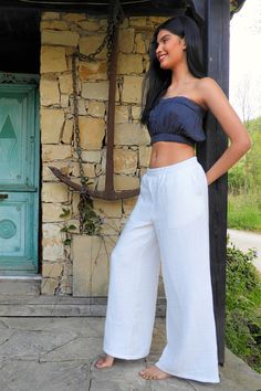 Designed to be your favorite for summer, these palazzo pants are just not the superstars in style but they're extremely comfy, too. Ethically handmade from organic gauze cotton fabric, these pants provide a sustainable solution for modern fashion. They're lightweight and breathing... What else can you ask for? We offer a variety of size options including plus, big and tall. Recommended Season: Summer & warm days of spring and fall. HOW TO STYLE THESE PANTS?Match these harem pants with our crop t Breezy Cotton Bottoms For Summer, Summer Wide-leg Harem Pants, White Cotton Wide Leg Pants For Summer, Spring Breezy Cotton Pants, Breezy Cotton Pants For Spring, Summer Cotton Wide-leg Harem Pants, Summer Wide Leg Pants With Loosely Fitted Hips, Summer Wide Leg Cotton Pants Relaxed Fit, Relaxed White Linen Wide Leg Pants For Summer