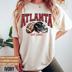 Comfort Colors Atlanta Football Shirt * Atlanta Football Sweatshirt * Vintage Style Atlanta Football shirt * Atlanta sweater * MC189 We create custom sweatshirts with great designs for everyone's liking. If you don't find the size or color you would like, please message us and we will be happy to accommodate! PRODUCT We use the finest premium Comfort Colors® 1566 crew-neck Garment-Dyed Sweatshirt & Comfort Colors® 1717 Garment-Dyed T-shirt, they are feather soft and very breathable with a good s Collegiate Crew Neck T-shirt With Custom Print, Collegiate Custom Print Crew Neck T-shirt, Collegiate Crew Neck Top With Custom Print, Custom Print Long Sleeve College T-shirt, Custom Print College Fan Apparel Tops, Custom Print Crew Neck Fan Gear Top, Custom Print Crew Neck Top For Fan Gear, Fan Apparel Tops With Custom Print For College, College Fan Apparel Tops With Custom Print