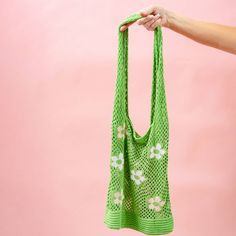 Our floral crochet slouchy shoulder bags are a hot trend for the 'That Girl' aesthetic. On trend with retro flowers embroidered on it. These crochet bags are perfect for shopping, the farmers market, traveling, beach, you name it! . Features: -Lightweight and portable -Bag dimensions: 15” x 15” -Handle dimensions: 13” L Rooting Roses, That Girl, Slouchy Tote, Crochet Market Bag, Portable Bag, Floral Crochet, Crochet Tote, Kids Graphic Tees, Crochet Bags