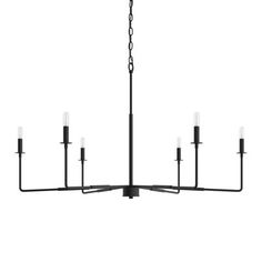 a black chandelier with six lights hanging from it's center and four arms