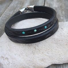 "Made from top quality vegetable tanned leather. Hand painted and stamped leather wrap around bracelet. It is embellished with natural Tibetan Turquoise cabochons. Bangle is 1 cm wide and with zamak clasp closure. Please measure carefully your wrist and select the most preferable size! If you need a diferent size, please let me know after purchase in \"note for seller\". Please visit to my another shop: https://www.etsy.com/shop/JeansBelt?ref=hdr_shop_menu FEDEX to USA and Australia! If you need Turquoise Leather Concho Bracelets, Western Style Turquoise Leather Bracelets, Southwestern Hand Tooled Leather Bracelets, Adjustable Turquoise Leather Bracelet With Concho, Rustic Turquoise Leather Bracelet, Southwestern Style Leather Bracelets For Festivals, Adjustable Western Leather Bracelet, Southwestern Leather Bracelet For Festival, Unique Turquoise Leather Bracelets