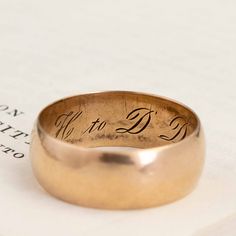 I have always been drawn and acquire most vintage bands I come across - bands with built-in love and history in them - what could be better? The perfect vehicle to symbolize one's commitment, and for you to add your own story to! Perfect for stacking to boot. 10kt Rose Gold Size 9.5 & resizable 7.70mm Wide Engraved "H to D Dec 25th 09" Classic Engraved Ring With Hallmarks, Classic Engraved Band As Gift, Vintage Engraved Promise Ring, Vintage Engraved Ring With Round Band, Vintage Jewelry With Engraving Option Round Band, Vintage Promise Ring With Engraving Option, Vintage Promise Rings With Engraving Option, Vintage Jewelry With Engraving Option, Vintage Stamped Engraved Ring