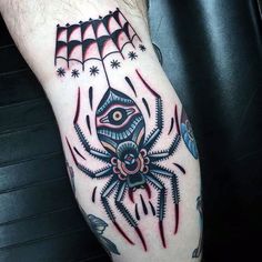 a man with a spider tattoo on his arm