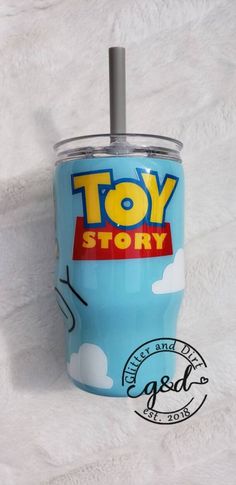 the toy story tumbler cup is on display