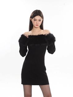 Embrace elegance with a twist in this off-shoulder faux fur trim mini dress, a chic addition to any wardrobe. Crafted with attention to detail, this dress features a sleek silhouette, long sleeves, and a playful faux fur trim that graces the shoulders, adding a touch of glamour. The fabric composition prioritizes comfort and style, ensuring a flattering fit for those evenings out or special events. Style this versatile piece with booties or heels for an evening look, or dress it down with a pair Social Gathering, Fur Trim, Mini Black Dress, Timeless Design, Date Night, Fashion Forward, Faux Fur, Off Shoulder, Twist