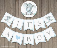 an elephant banner with the words it's a boy