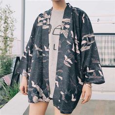 Rock the Town in Our Short Kimono in Crane Print Our trendy Crane Printed Kimono Cardigan is one of a kind piece! You can dress it up or down for a casual daytime look or semi-dressy casual look pair with the right accessories and shoes. This haori jacket is the perfect cover-up to pair with jeans or shorts and a pretty fitted top. Made from polyester with the popular Japanese crane print, available in two colors, red and dark grey. Product Type: Haori; Kimono Cardigan Composition of Japanese Ja Yukata Female, Kimono Diy, Japanese Yukata, Oki Doki, Traditional Japanese Kimono, Kimono Shirt, Island Outfit, Kimono Blouse, Kimono Outfit