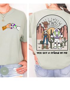 Embark on a nostalgic journey with our "Toy Story Harmony: You've Got a Friend Tee." This cotton t-shirt, inspired by the iconic Toy Story duo Buzz and Woody, brings the magic of friendship to life. On the back, a heartwarming scene unfolds as Buzz and Woody extend their hands, symbolizing the timeless bond of camaraderie. Crafted with comfort in mind, this tee is perfect for reliving cherished memories from the beloved Toy Story franchise. The design captures the essence of camaraderie, celebrating the enduring message that true friendship knows no boundaries. Embrace the spirit of togetherness with this delightful tee, where every wear is a reminder that you've got a friend in this whimsical journey called life. *Unisex Sizing* Daisy Crafts, Buzz And Woody, Oopsie Daisy, Dance Marathon, Woody And Buzz, Toy Story Shirt, Friends Tee, Disneyland Shirts, Aunt Shirts