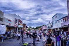 a group of people playing music on the street